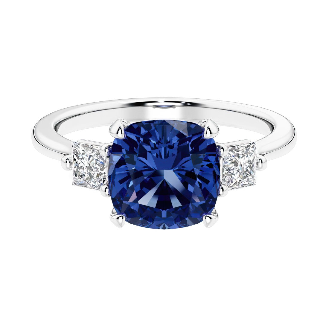 Cushion shaped engagement ring with brilliant diamonds and blue gemstone.