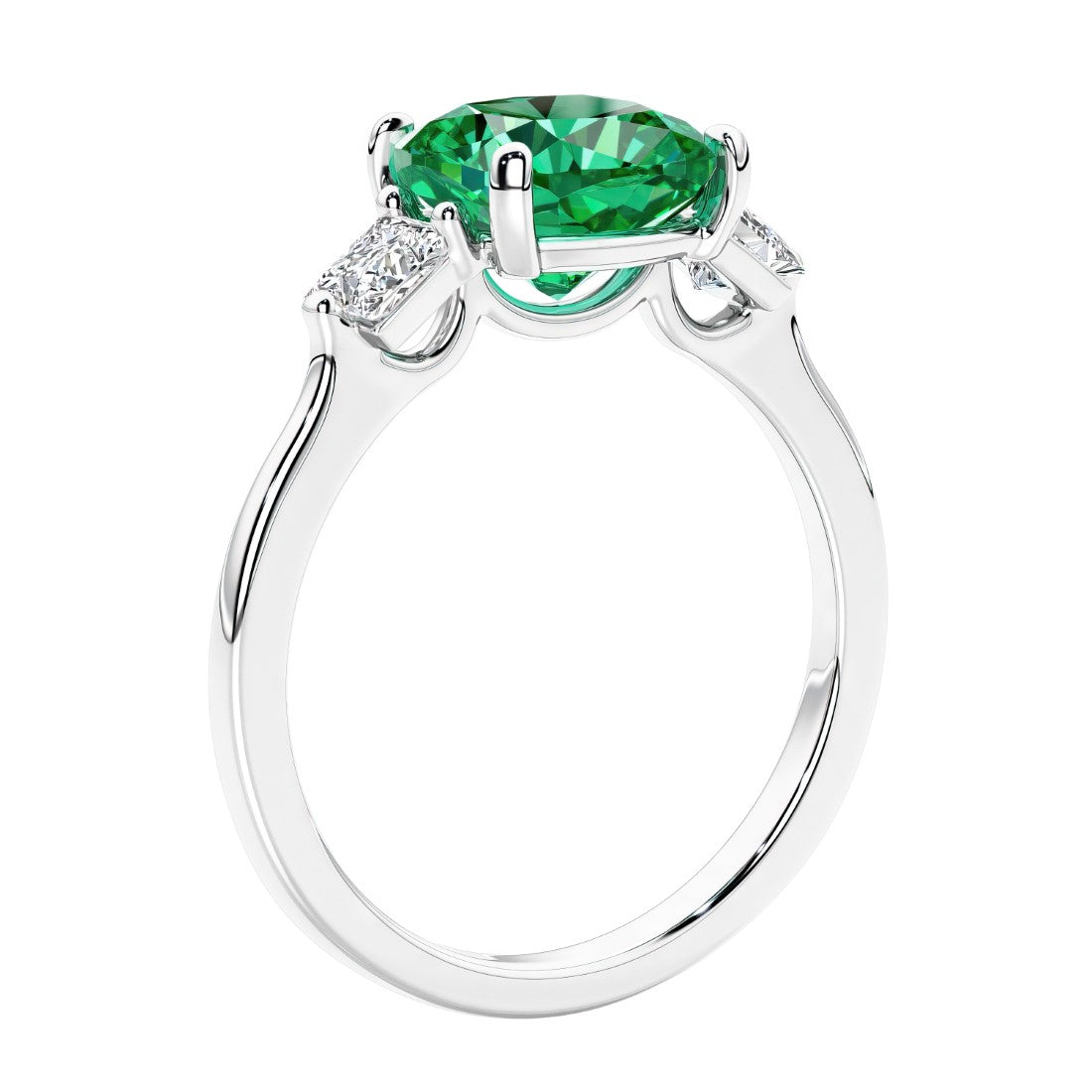 Cushion cut diamond ring as a unique engagement ring featuring three stone design with green gemstone and diamonds.