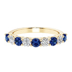 Ladies diamond anniversary bands featuring 9 sparkling diamonds in shared prong style.