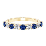 Ladies diamond anniversary bands featuring 9 sparkling diamonds in shared prong style.
