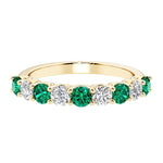 Ladies diamond anniversary bands featuring 9 sparkling diamonds in shared prong style.