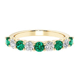 Ladies diamond anniversary bands featuring 9 sparkling diamonds in shared prong style.