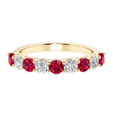 Ladies diamond anniversary bands featuring 9 sparkling diamonds in shared prong style.