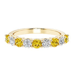 Ladies diamond anniversary bands featuring 9 sparkling diamonds in shared prong style.