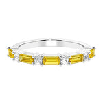 Ladies diamond anniversary band with nine stones, featuring a mix of gemstones and lab diamonds.