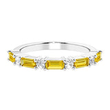 Ladies diamond anniversary band with nine stones, featuring a mix of gemstones and lab diamonds.