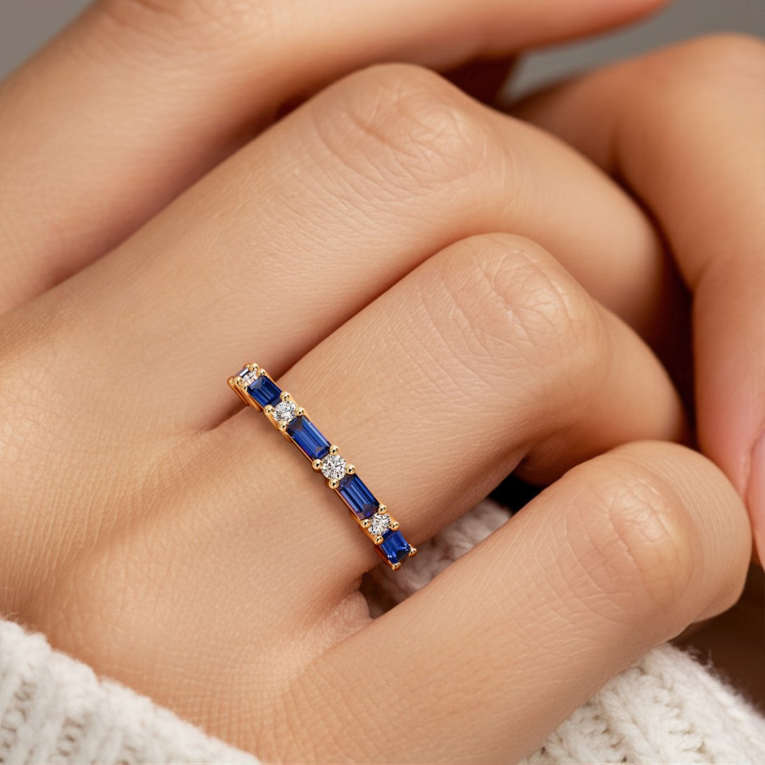 Nine stone anniversary diamond ring for women with vibrant gemstones and white diamonds.