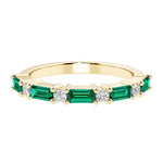 9 stone gemstone anniversary ring with alternating diamonds and gemstones in yellow gold.