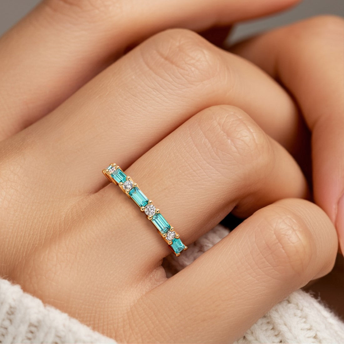 Nine stone anniversary diamond ring for women with vibrant gemstones and white diamonds.