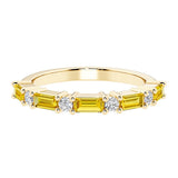 9 stone gemstone anniversary ring with alternating diamonds and gemstones in yellow gold.