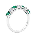 Anniversary diamond ring featuring 7 lab created diamonds and gemstones in a classic band.