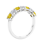 Anniversary diamond ring featuring 7 lab created diamonds and gemstones in a classic band.