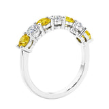 Anniversary diamond ring featuring 7 lab created diamonds and gemstones in a classic band.