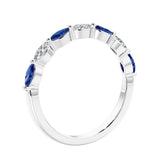 Anniversary diamond ring featuring 7 lab created diamonds and gemstones in a classic band.