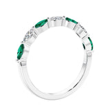 Anniversary diamond ring featuring 7 lab created diamonds and gemstones in a classic band.