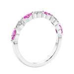 Anniversary diamond ring featuring 7 lab created diamonds and gemstones in a classic band.