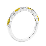 Anniversary diamond ring featuring 7 lab created diamonds and gemstones in a classic band.