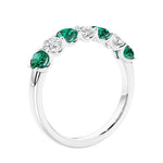 Anniversary diamond ring featuring 7 lab created diamonds and gemstones in a classic band.