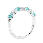 Anniversary diamond ring featuring 7 lab created diamonds and gemstones in a classic band.