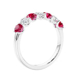 Anniversary diamond ring featuring 7 lab created diamonds and gemstones in a classic band.