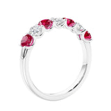 Anniversary diamond ring featuring 7 lab created diamonds and gemstones in a classic band.