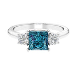 3 stone princess diamond ring in sleek white gold with alexandrite gemstone.