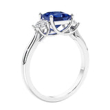 3 stone princess diamond ring in sleek white gold.