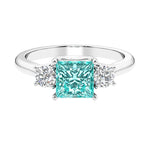 3 stone princess diamond ring in sleek white gold with paraiba tourmaline gemstone.
