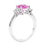 3 stone princess diamond ring in sleek white gold.
