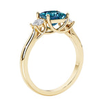 Princess shaped three stone diamond ring in modern style.