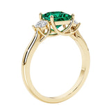 Princess shaped three stone diamond ring in modern style.
