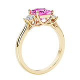 Princess shaped three stone diamond ring in modern style.