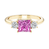 Princess cut 3 stone engagement ring with side diamonds and pink sapphire gemstone center.