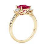 Princess shaped three stone diamond ring in modern style.