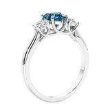 3 stone diamond engagement ring with Heart shaped center in white gold.