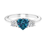 3 stone Heart diamond ring set in a delicate band.