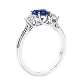 3 stone diamond engagement ring with Heart shaped center in white gold.