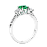 3 stone diamond engagement ring with Heart shaped center in white gold.