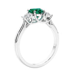 3 stone diamond engagement ring with Heart shaped center in white gold.