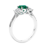 3 stone diamond engagement ring with Heart shaped center in white gold.