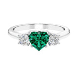 3 stone Heart diamond ring set in a delicate band.