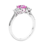 3 stone diamond engagement ring with Heart shaped center in white gold.