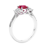 3 stone diamond engagement ring with Heart shaped center in white gold.