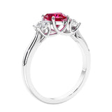 3 stone diamond engagement ring with Heart shaped center in white gold.
