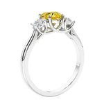3 stone diamond engagement ring with Heart shaped center in white gold.