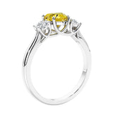 3 stone diamond engagement ring with Heart shaped center in white gold.