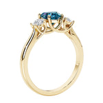 Three stone Heart shaped engagement ring with vintage styling.