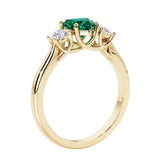 Three stone Heart shaped engagement ring with vintage styling.