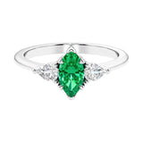 Three stone marquise diamond ring with dramatic center shape.