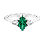 Three stone marquise diamond ring with dramatic center shape.